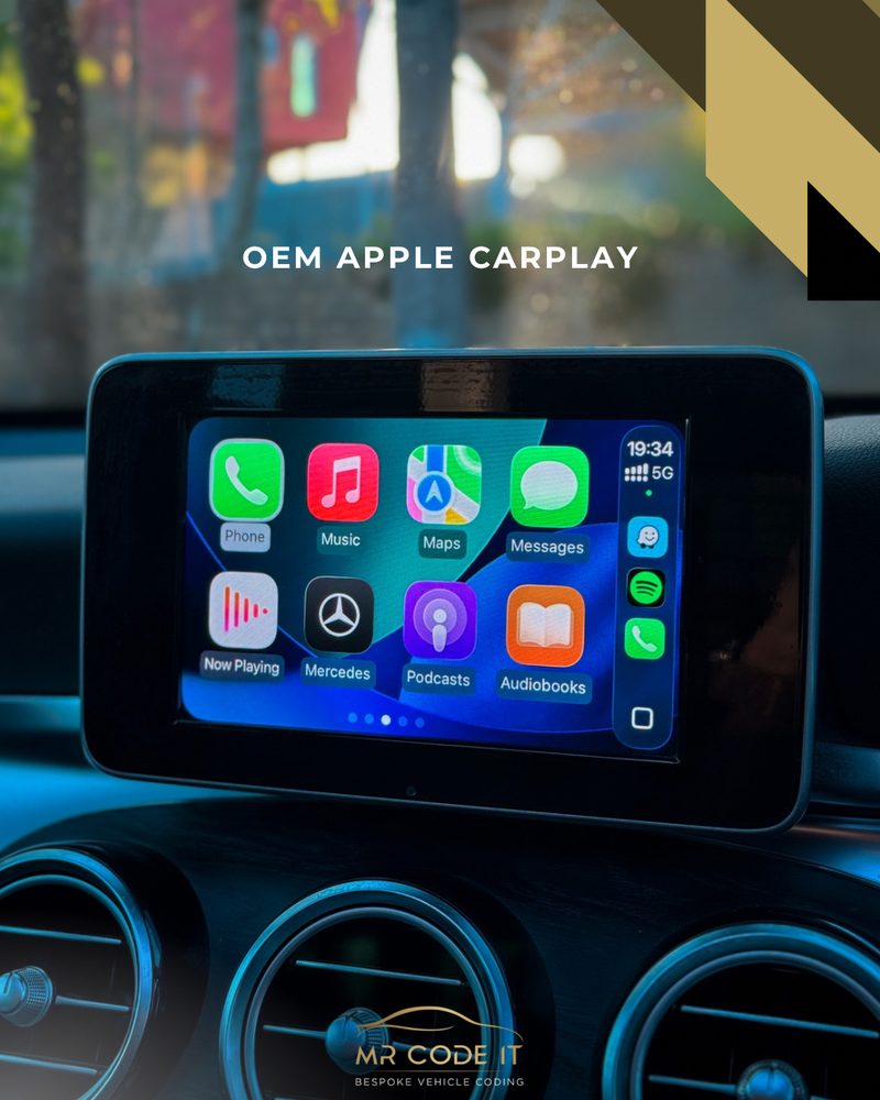 Apple CarPlay running through the factory NTG5.2 display, showing home screen apps