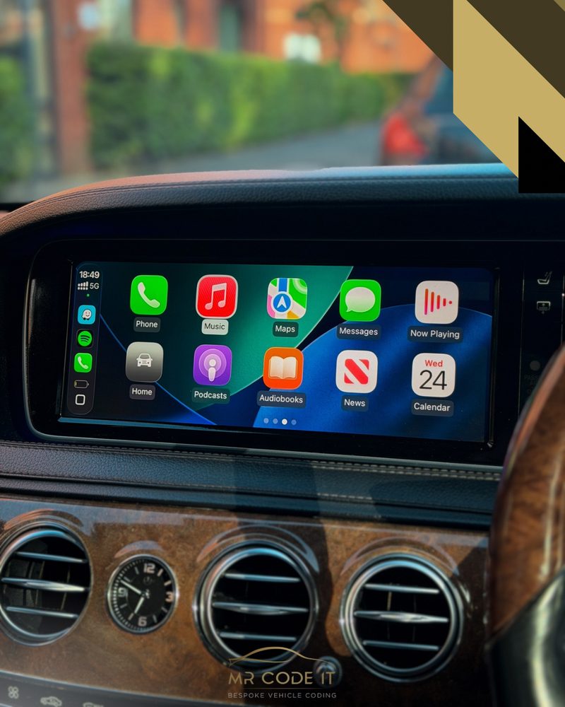 Apple CarPlay home screen running through the integration box on a Mercedes S-Class