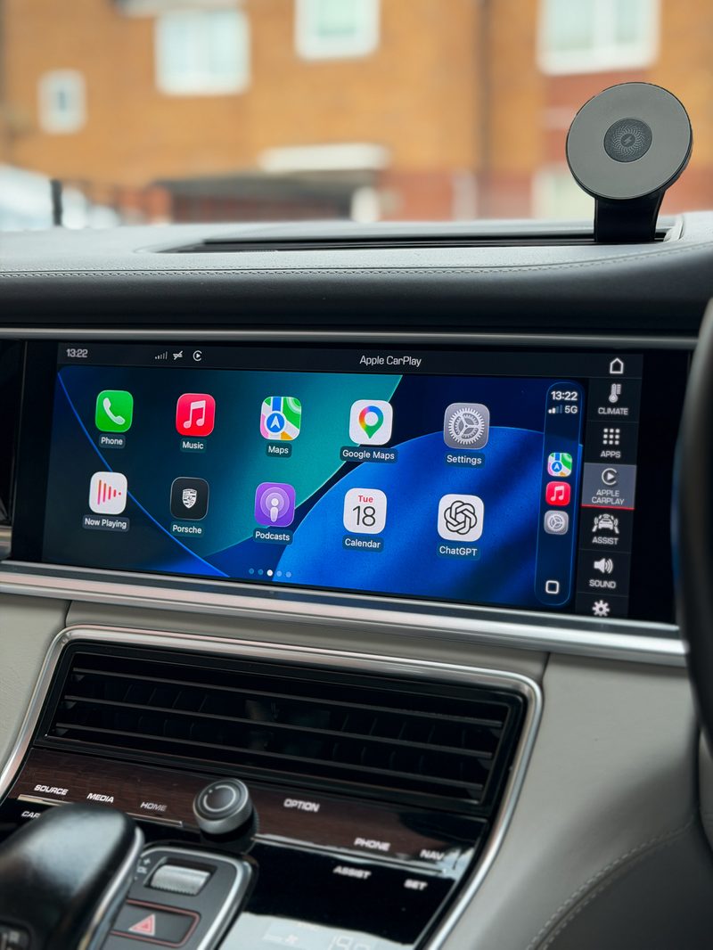 After — fullscreen Apple CarPlay active on a Porsche PCM4.1 display, home screen