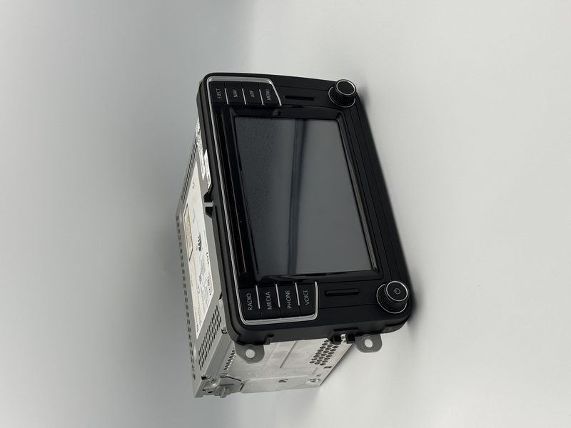 VW PQ-platform head unit before disassembly — VW/Skoda/SEAT Screen Digitiser Replacement Service on a Volkswagen