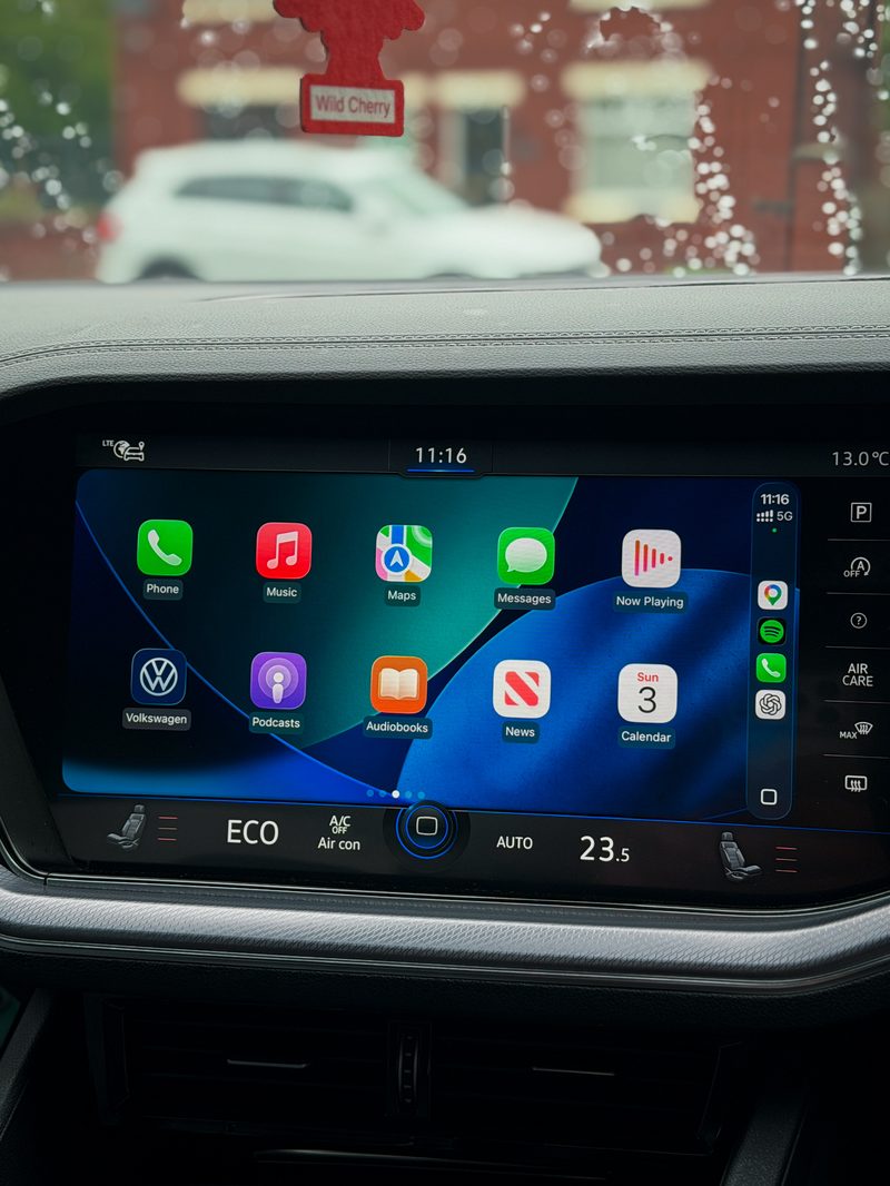 After — fullscreen Apple CarPlay active on a VW Touareg